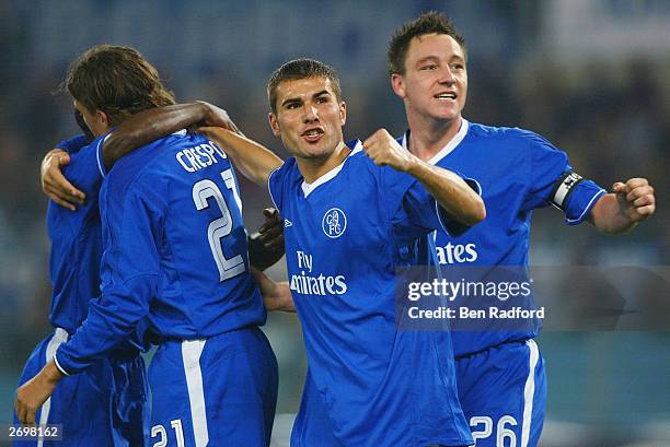 Andrian Mutu and John Terry of Chelsea celebrate after Hernan Crespo of Chelsea scores the first goal for Chelsea during the UEFA Champions League...