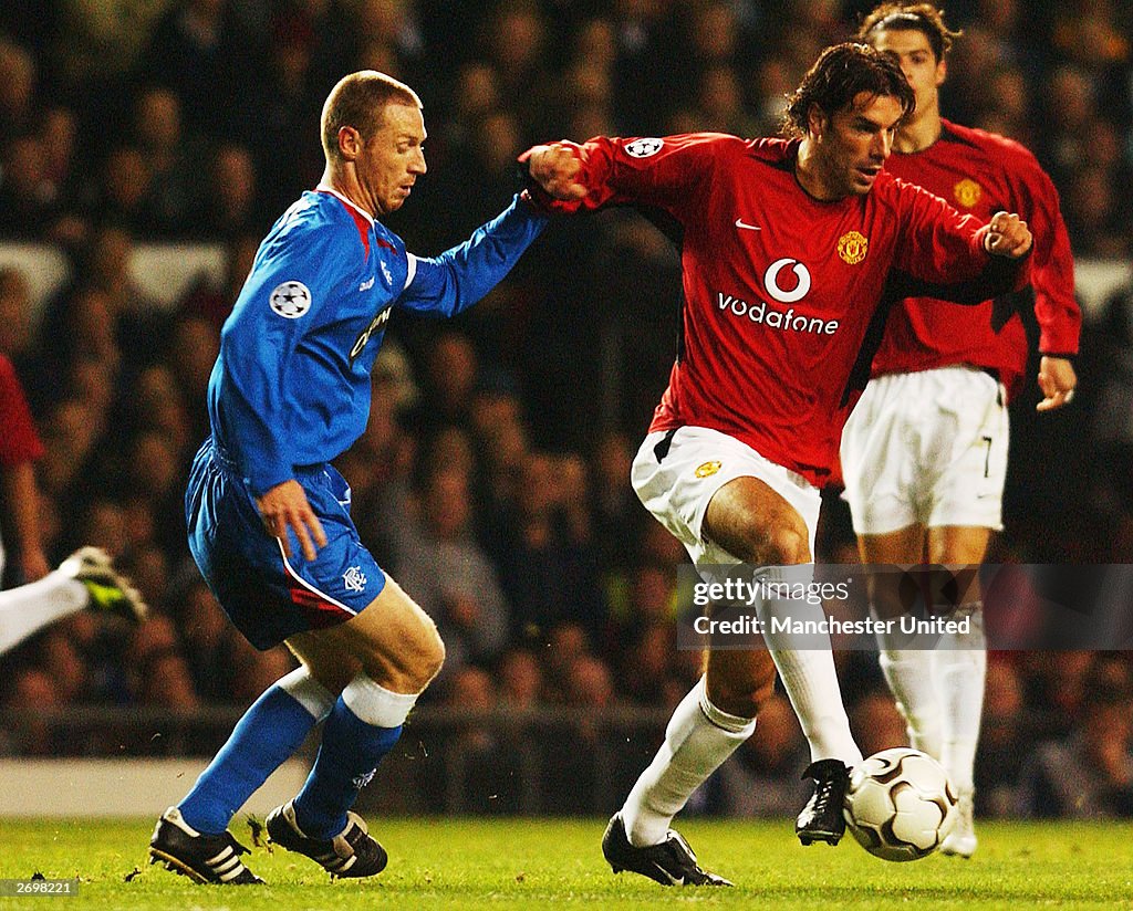 Ruud Van Nistelrooy and Craig Moore clash