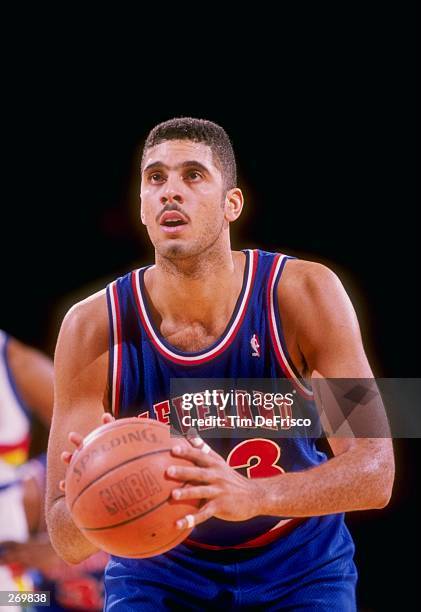 Center Brad Daugherty of the Cleveland Cavaliers looks to shoot the ball during a game against the Denver Nuggets.