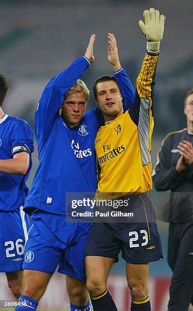 Eidur Gudjohnen and Carlo Cudicini celebrate on the pitch after Chelsea's victory during the UEFA Champions League First Stage Group G match between...