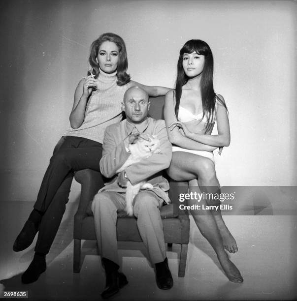 English stage and film actor Donald Pleasence with Karin Dor and Mie Hama, in a James Bond photocall from 'You Only Live Twice,' in which he plays...