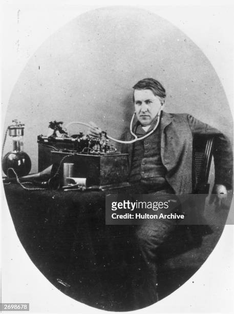Thomas Edison the inventor and physicist with his phonograph.
