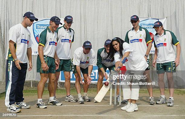 Michael Bevan, Andy Bichel, Nathan Bracken, Jimmy Maher, Adam Gilchrist, Michael Kasprowicz and Brad Williams of Australia with Indian TV cricket...