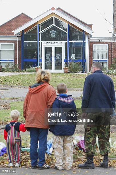 Well-wishers arrive to pay their respects outside Birkbeck School and Community Arts College on November 5, 2003 in North Somercotes, Lincolnshire,...