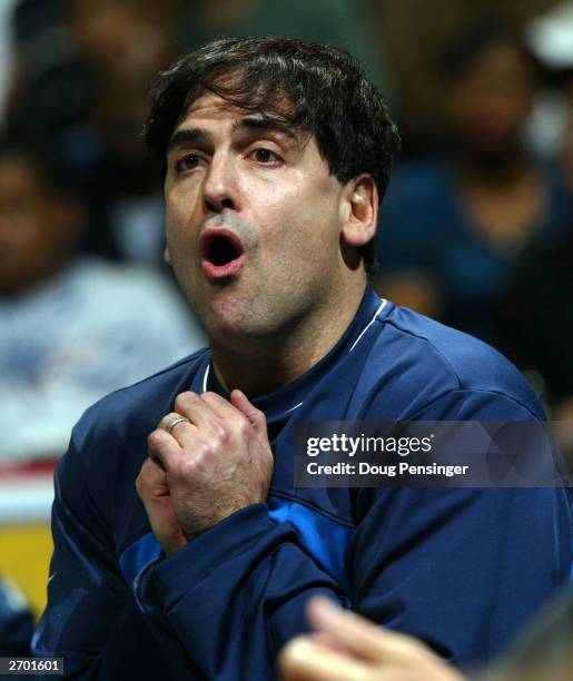 Mark Cuban owner of the Dallas Mavericks reacts to a play as the Washington Wizards defeated the Mavericks 100-90 during NBA action November 5, 2003...