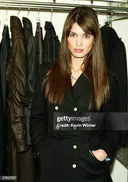 Model Cinthia Moura poses at a party held at Ferre Rodeo Store on November 5, 2003 in Beverly Hills, California.