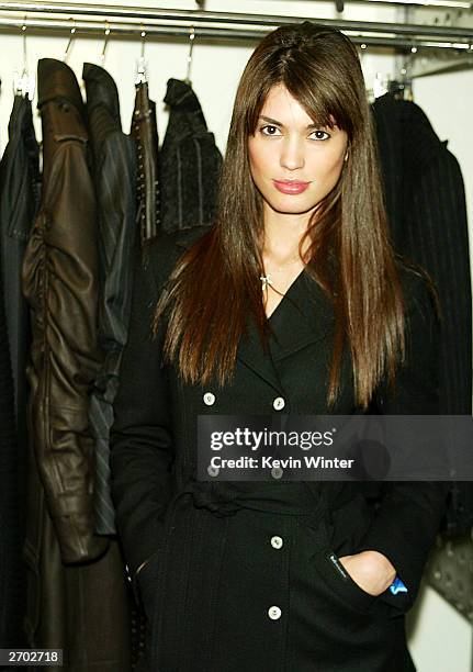 Model Cinthia Moura poses at a party held at Ferre Rodeo Store on November 5, 2003 in Beverly Hills, California.
