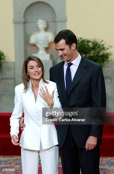 Crown Prince Felipe of Spain and Letizia Ortiz pose during an official engagement ceremony at the garden of El Pardo Palace November 6, 2003 at...