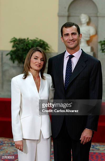 Crown Prince Felipe of Spain and Letizia Ortiz pose during an official engagement ceremony at the garden of El Pardo Palace November 6, 2003 at...