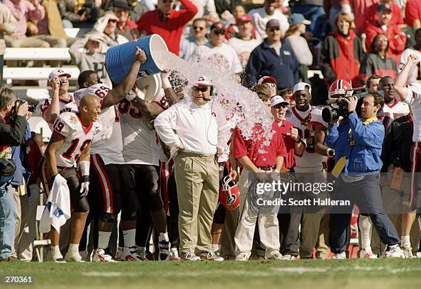 Coach Jim Donnan of the Georgia Bulldogs watches his players during the Outback Bowl against the Wisconsin Badgers. Georgia won the game 33-6....