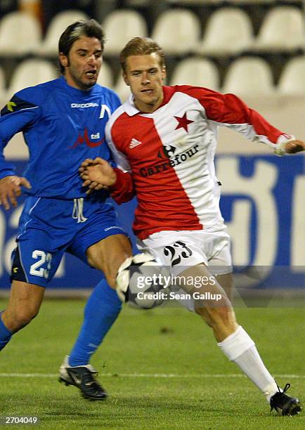Radek Bejbl of Slavia Prague battles for the ball with Martin Stankov of Levski Sofia during the Slavia Prague v Levski Sofia UEFA Cup 2nd Round...