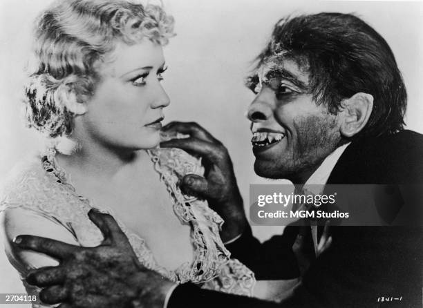 American actor Miriam Hopkins reacts with fright as she is grabbed by the shoulders by actor Fredric March , portraying the monster Mr. Hyde, in a...