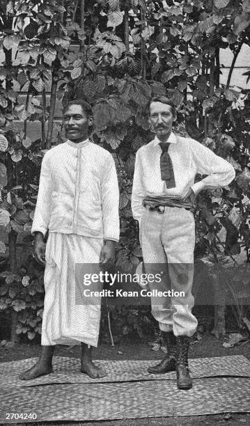Scottish author Robert Louis Stevenson standing with an unidentified Samoan man, Upolu, Samoa, circa 1889.