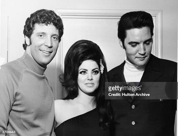 Welsh-born entertainer Tom Jones poses with Elvis Presley and his wife Priscilla, Las Vegas, Nevada, 1st July 1971.