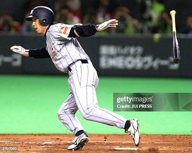 Japanese national baseball team captain Shinya Miyamoto makes a hit during the Asian Asian Baseball Championships against South Korea at the Sapporo...