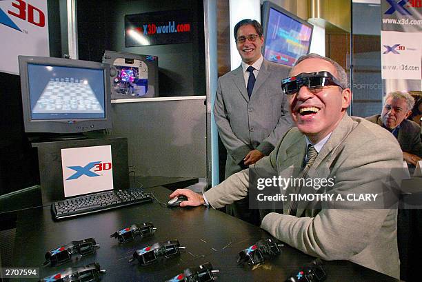 Legendary chess champion, Garry Kasparov wears his X3D viewing glasses, during a press conference in New York 07 November to demonstrates how he will...