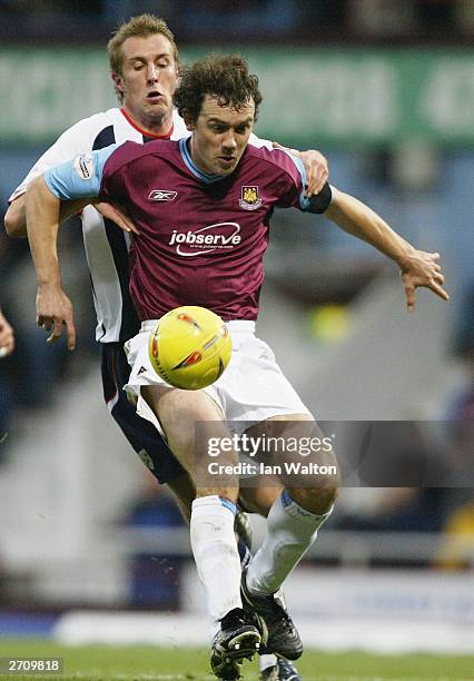 Rob Hulse of West Bromwich Albion tries to tackle Christian Dailly of West Ham during the Nationwide division one match between West Ham United and...