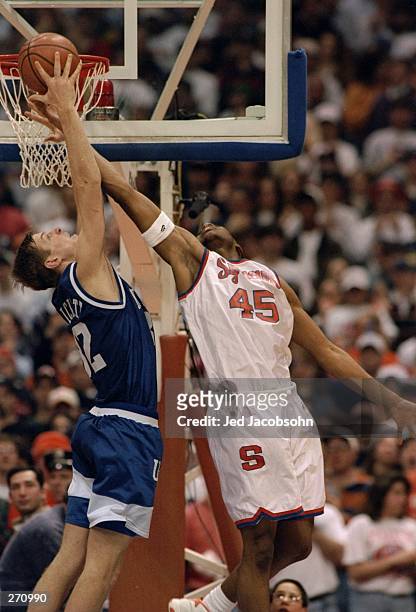 Center Otis Hill of the Syracuse Orangemen goes up for the ball during a game against the Kentucky Wildcats. Syracuse won the game, 93-85.