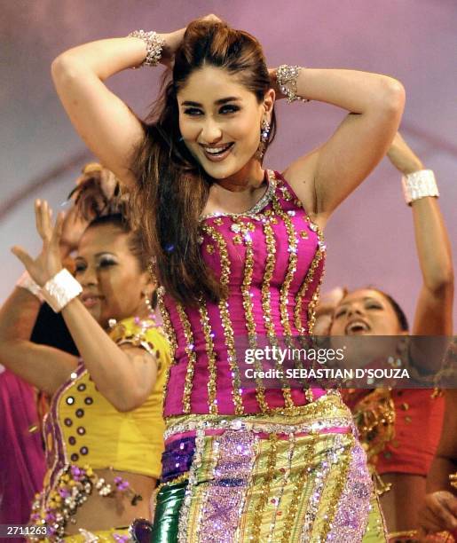 Indian film actress Kareena Kapoor performs at a concert for the World Youth Peace Summit in Bombay, 08 November 2003. The concert was organised by...