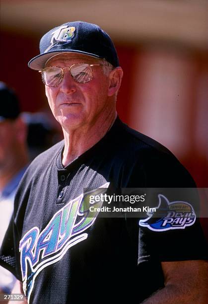 Frank Howard of the Tampa Bay Devil Rays looks on during a spring training game against the Cincinnati Reds at the Ed Smith Stadium in Sarasota,...