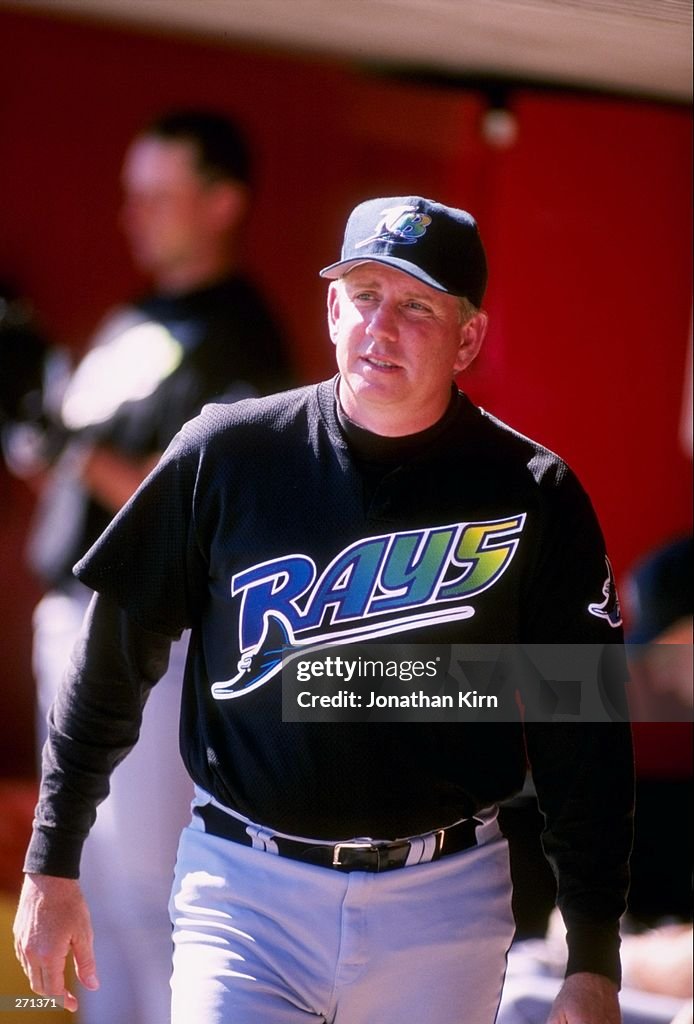 Larry Rothschild Signature Larry Rothschild of the Tampa Bay Devil Rays looks on during a spring ...