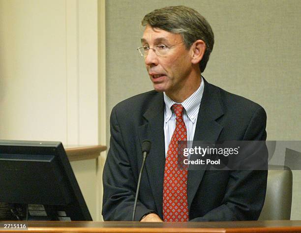 George Mason University professor Steven S. Fuller testifies during the trial of Washington area sniper suspect John Allen Muhammad in Virginia Beach...