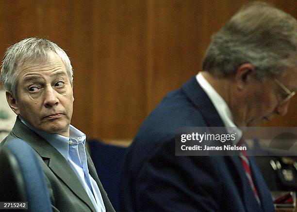 Millionaire murder defendant Robert Durst sits in State District Judge Susan Criss court with his attorney Dick DeGuerin November 10, 2003 at the...