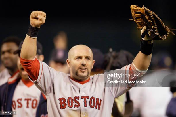 Kevin Millar of the Boston Red Sox celebrates the victory over the Oakland A's in game 5 of the 2003 American League Divisional Series at the Network...