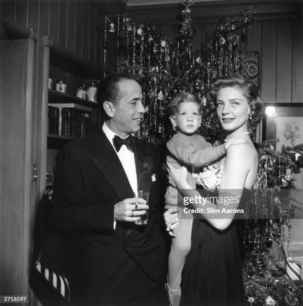 Premium Rates Apply. American actor Humphrey Bogart with his wife Lauren Bacall and their son Stephen at their home in Beverly Hills in California on...