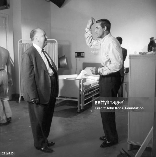 Cary Grant and Alfred Hitchcock on the set of their fourth collaboration, the spy drama 'North by Northwest'. Both men were born in England, but made...