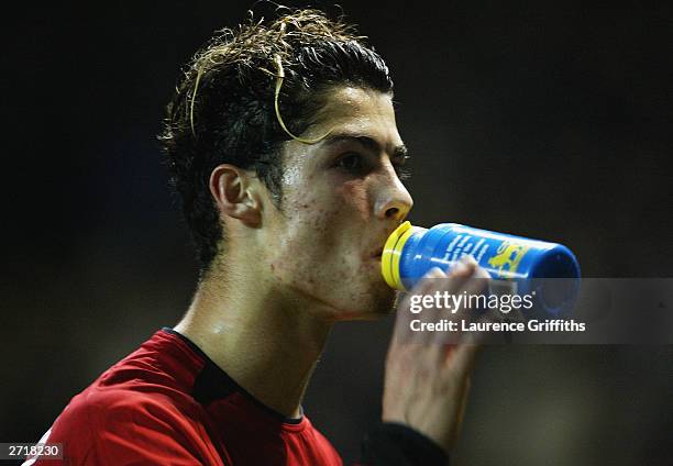 Cristano Ronaldo of Manchester United takes a drink during the UEFA Champions League match between Manchester United and Rangers on November 4, 2003...