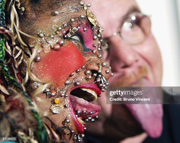 Worlds most pierced woman Elaine Davidson and man with longest tongue Stephan Taylor pose for photographers at the photocall for the 100 millionth...