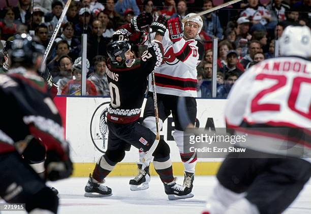 Leftwinger Jim Cummins of the Phoenix Coyotes in action during a game against the New Jersey Devils at the Continental Airlines Arena in East...