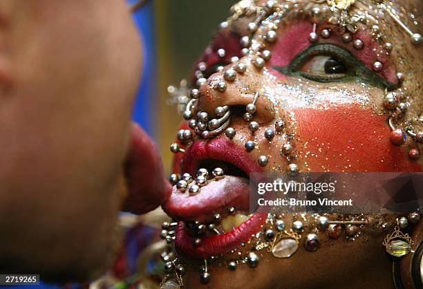 Worlds most pierced woman Elaine Davidson and man with longest tongue Stephan Taylor pose for photographers at the photocall for the 100 millionth...