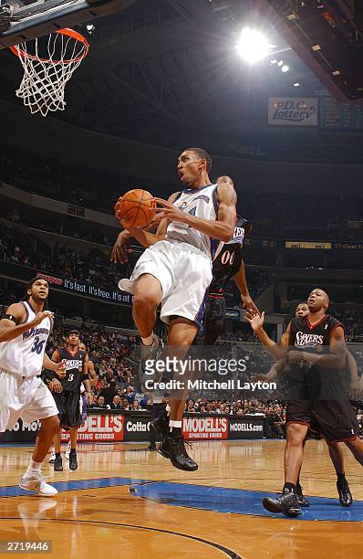Jared Jeffries of the Washington Wizards goes for a layup against the Philadelphia 76ers during a game November 11th, 2003 at the MCI Center in...