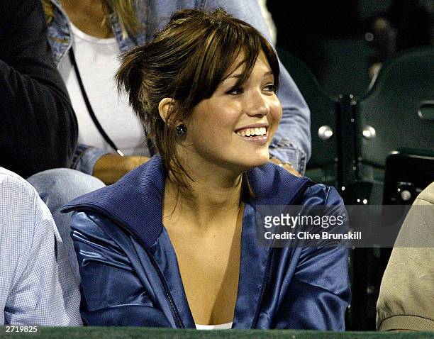 Singer Mandy Moore watches Andy Roddick play Carlos Moya of Spain during the Tennis Masters Cup November 11, 2003 at the Westside Tennis Club in...
