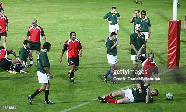 Nick Love of the Bali Legends celebrates after his try during the Bali Rememberance Match between the Bali Legends and the Australian Barbarians at...