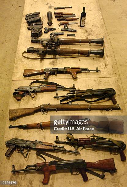 In this handout image provided by the U.S. Air Force, confiscated weapons lie on a floor November 10, 2003 at Kirkuk Air Base in Iraq. U.S. Soldiers...