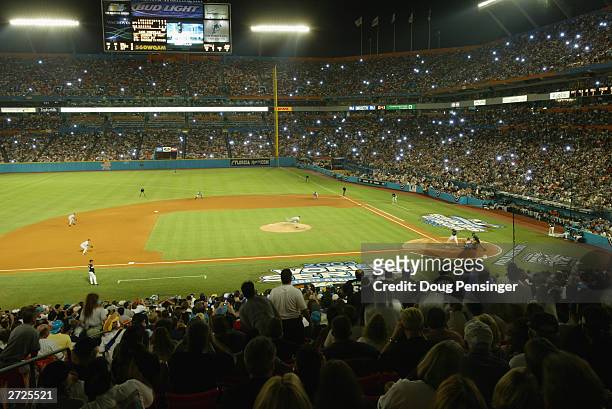 Starting pitcher Roger Clemens of the New York Yankees faces his last batter Luis Castillo of the Florida Marlins before leaving the game in the...