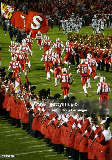 The Maryland Terrapins take to the field prior to the game as they host the Virginia Cavaliers during NCAA football action on November 13, 2003 at...