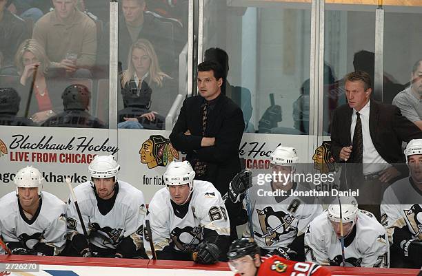 Head Coach Ed Olczyk of the Pittsburgh Penguins looks on from the bench during a game against the Chicago Blackhawks on October 30, 2003 at the...