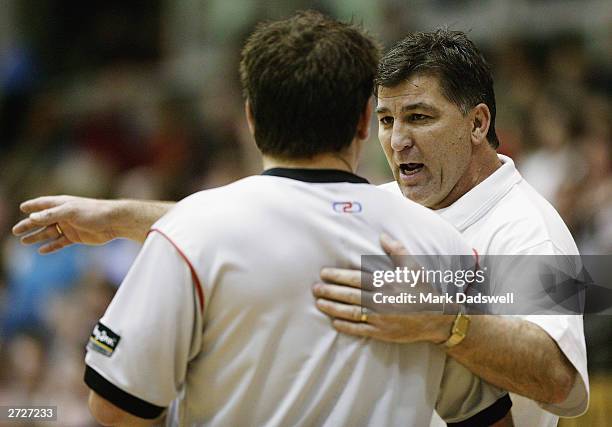 Brendan Joyce coach of the Hawks questions a decision with a referee during the NBL round 7 match between the Liberty Giants and the Wollongong Hawks...