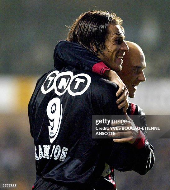 Standard's scorers Alexandros Kaklamanos and Jonathan Walasiak celebrate after Walasiak scored their fourth goal during the first league top soccer...