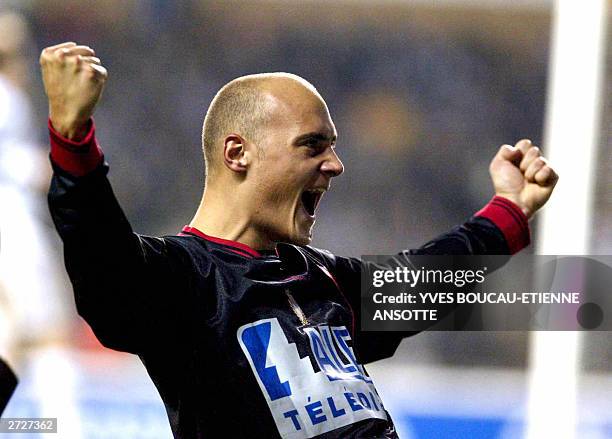 Standard's Jonathan Walasiak celebrates after scoring his team's fourth goal during the first league top soccer match Anderlecht vs Standard, 09...