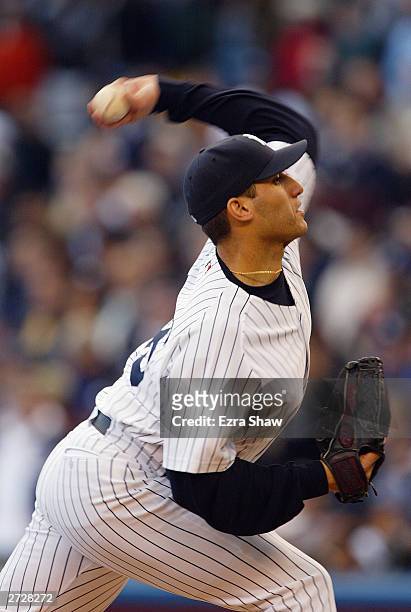 Starting pitcher Andy Pettitte of the New York Yankees pitches during game 6 of the American League Championship Series against the Boston Red Sox on...