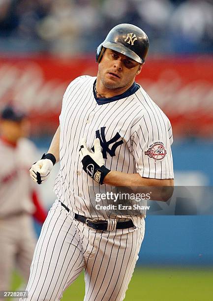 FIrst baseman Jason Giambi of the New York Yankees rounds the bases during game 6 of the American League Championship Series against the Boston Red...