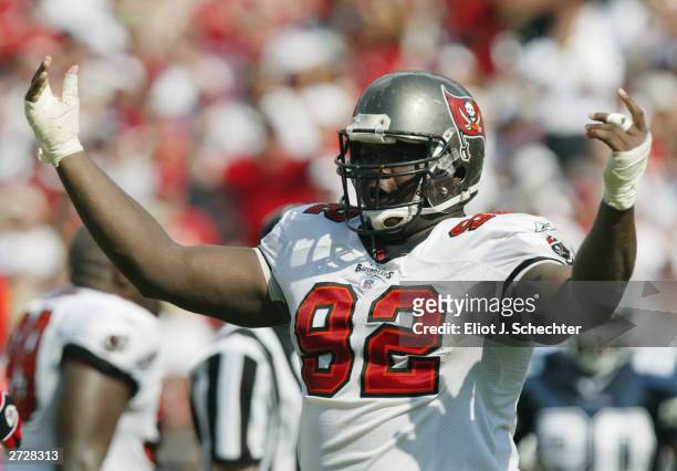 Defensive tackle Anthony McFarland of the Tampa Bay Buccaneers celebrates during the NFL game against the Dallas Cowboys at Raymond James Stadium on...