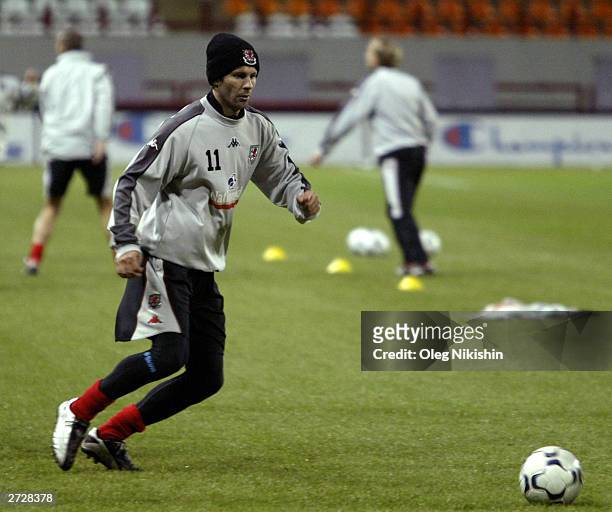 Ryan Giggs runs with the ball during Wales training at Locomotiv Stadium November 14, 2003 in Moscow, Russia. Wales are preparing for the first leg...