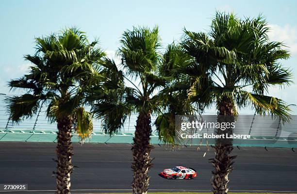 Tony Stewart driver of the Joe Gibbs Racing Home Depot Chevrolet on track in turn four during practice for the NASCAR Winston Cup Ford 400 at the...