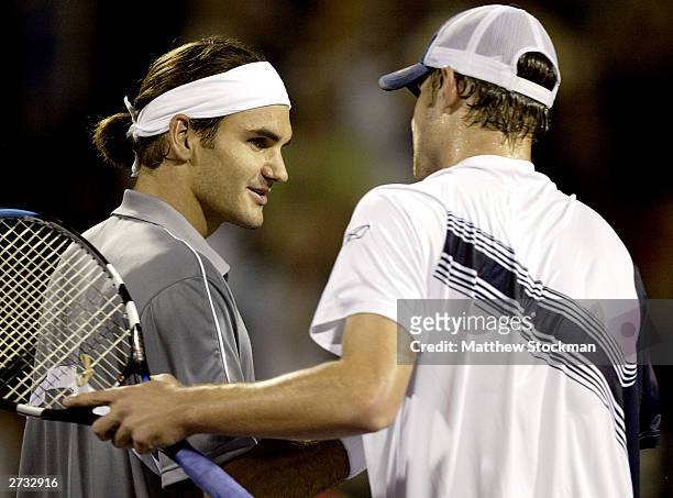 Roger Federer of Switzerland is congratulated by Andy Roddick after their match during the Tennis Masters Cup November 15, 2003 at the Westside...